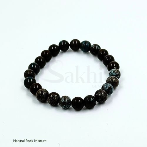 A beaded bracelet made of natural rock mixture, predominantly in dark colors, with variations in patterns and shades.